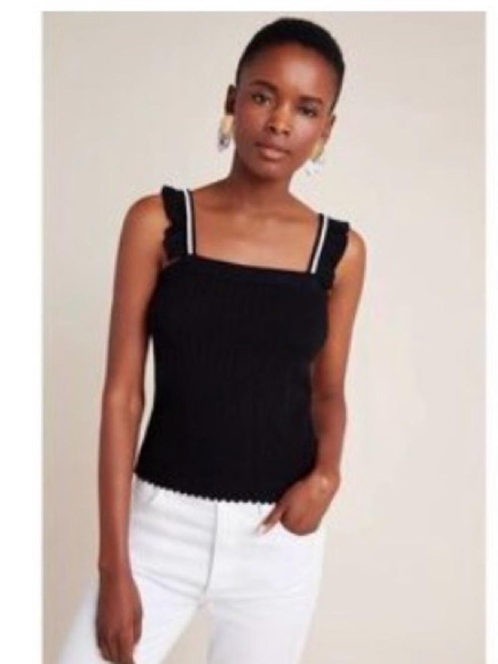 By Anthropologie black tank top. Size Medium